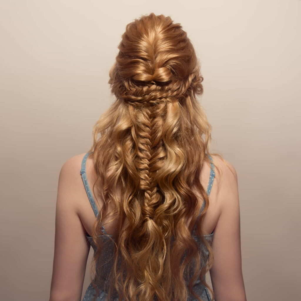 A back view of a woman with a beautiful braid tail hairstyle