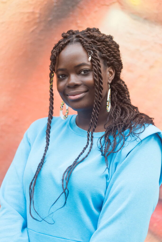 A woman with a kinky twist hairstyle.